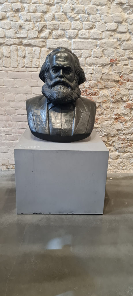 Photo of the exhibition space in Spandau Citadel, showing a view of the bust of Karl Marx on a pedestal